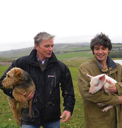 Hugh with pigs